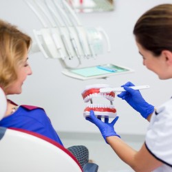 Patient in Lisle talking to dentist about dentures