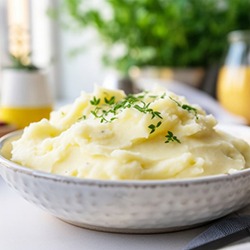 a bowl of soft mashed potatoes